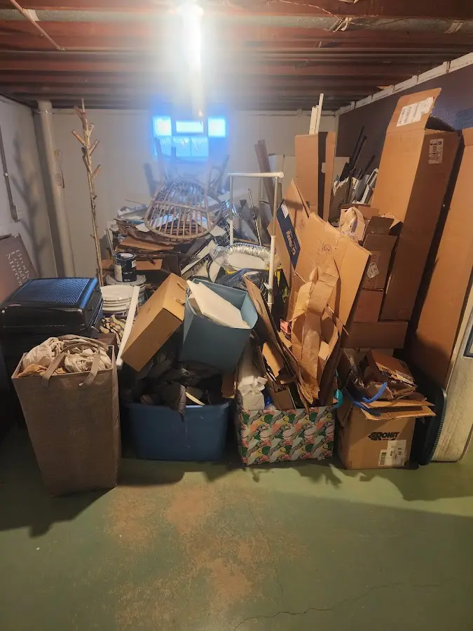 Roll-off dumpster container at job site for 2 Yard Dumpster Rental in Des Moines